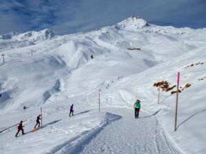 Tief verschneite Berge beim Swiss Snow Walk & Run in Arosa 2014